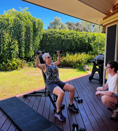 Personal trainer with his client